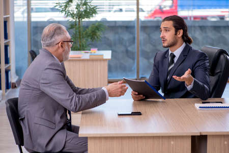 Two businessmen discussing business projectの写真素材