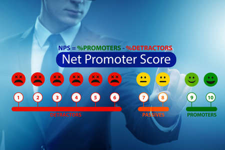 Net Promoter Score NPS concept with businessman pressing virtualの写真素材