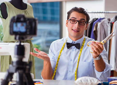 Young man working as fashion video blogger