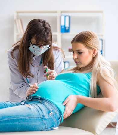 Pregnant woman at regular pregnancy check-upの写真素材