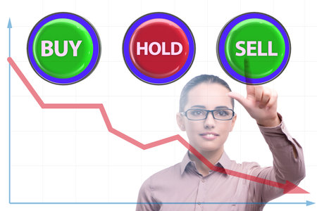 Concept of commercial choices between buying holding and sellingの写真素材