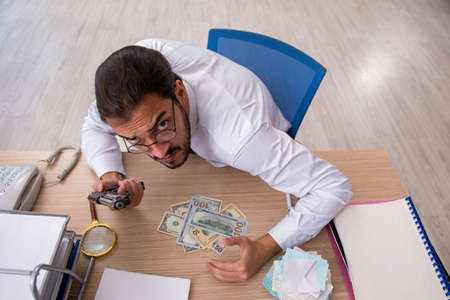 Angry male bookkeeper in bankruptcy concept