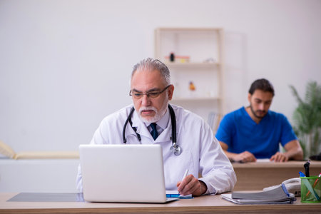 Two doctors working in the clinicの写真素材