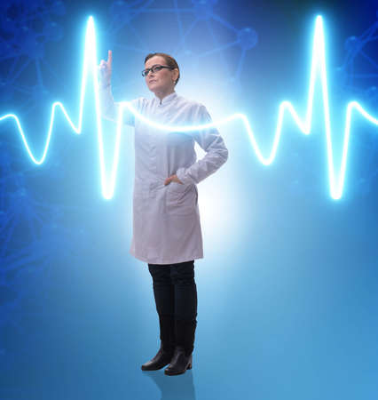 Woman doctor in telemedicine futuristic conceptの写真素材