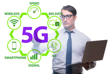 Businessman pressing button in 5g conceptの写真素材