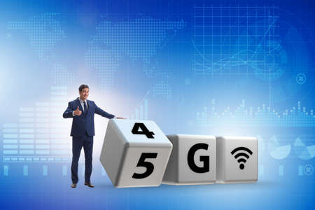 Businessman in transition from 4G to 5Gの写真素材
