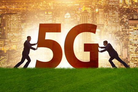 5G communication network concept with silhouettesの写真素材