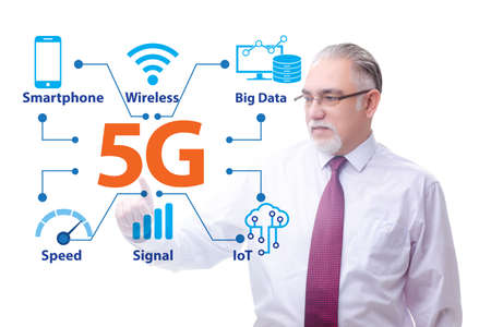 Businessman pressing button in 5g conceptの写真素材
