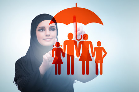 Life insurance concept with businesswoman pressing buttonの写真素材