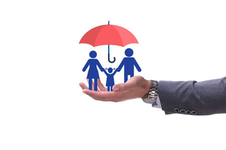 Life insurance concept with family under umbrellaの写真素材