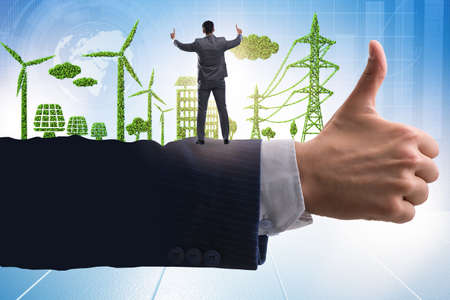 Green environment concept with businessmanの写真素材