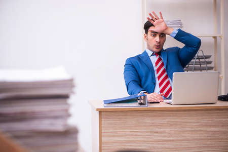 Young businessman employee working in the officeの写真素材
