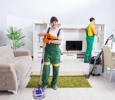 Cleaning professional contractors working at houseの写真素材