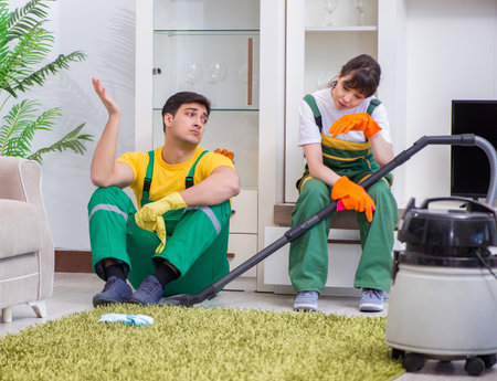 Cleaning professional contractors working at houseの写真素材