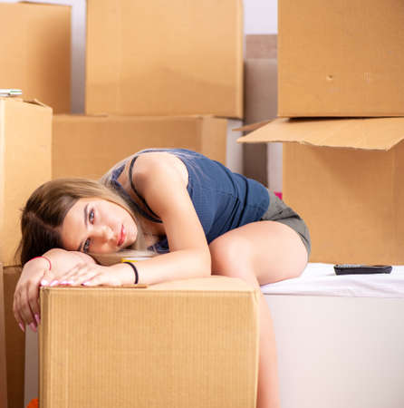 Young woman moving to new placeの写真素材