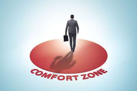 Businessman leaving his comfort zoneの写真素材