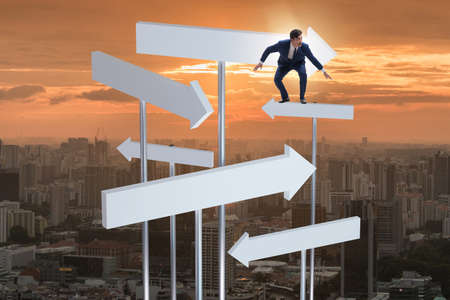 Businessman at the crossroads choosing strategy