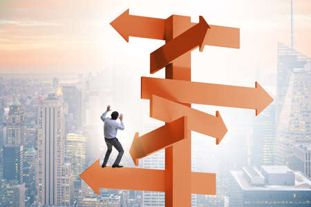 Businessman at the crossroads choosing strategy