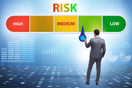 Businessman in risk metering and management conceptの写真素材