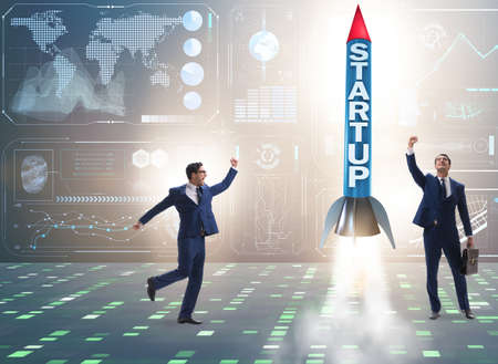 Start-up concept with rocket and businessman