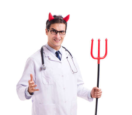 Devil doctor in funny medical concept isolated on white backgrouの写真素材