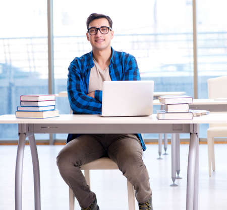 Student in telelearning distance learning concept reading in libの写真素材