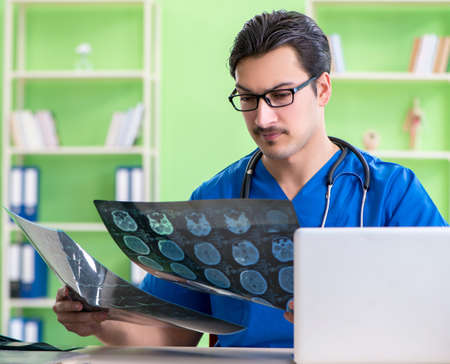 Young doctor working in the hospital