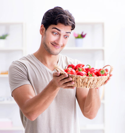Young man in healthy eating and dieting conceptの写真素材