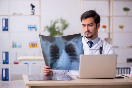 Young male doctor radiologist working in the clinic
