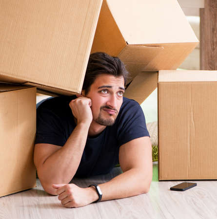 Man moving house with boxes