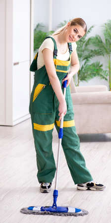 Woman female cleaner cleaning floor