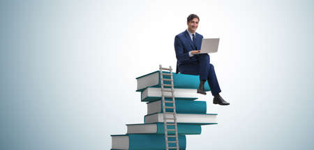 Businessman in telelearning concept with laptop