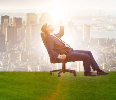 Young male businessman enjoying his time during vacationの写真素材