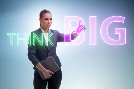 Think big concept with businesswomanの写真素材
