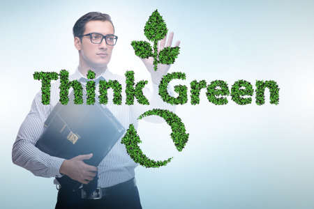 Think green ecological concept with businessmanの写真素材