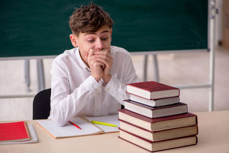 Boy sitting in the classromの写真素材