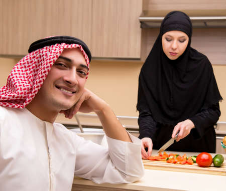 Young arab family in the kitchenの写真素材