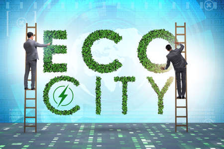 Eco city in ecology concept with businessmanの写真素材