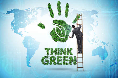 Think green ecological concept with businessmanの写真素材