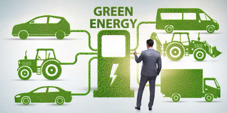 Businessman in the concept of electric charging and vehiclesの写真素材