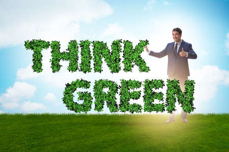 Businessman in think green conceptの写真素材