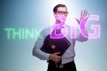 Think big concept with businessmanの写真素材