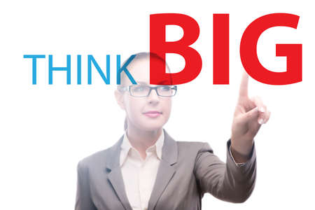 Think big concept with businesswoman