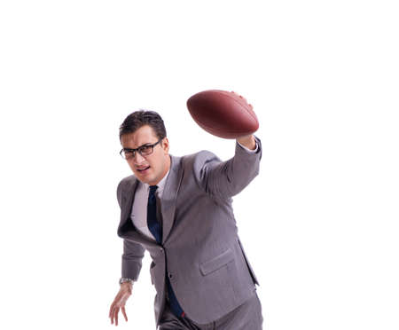 Businessman with american football isolated on whiteの写真素材