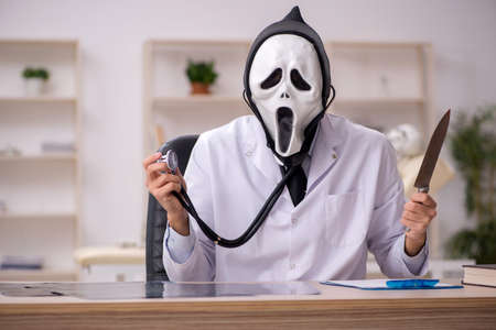 Devil doctor working in the clinicの写真素材