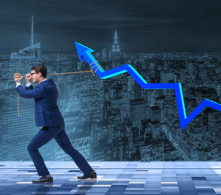 Businessman supporting increase in economy