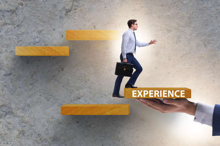 Experience business concept with businessmanの写真素材