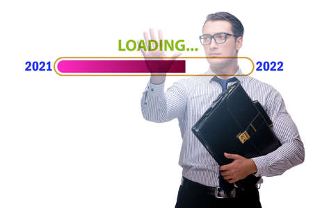 Businessman pressing virtual button with year 2022