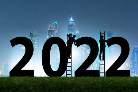 Concept of new year of 2022 with business people