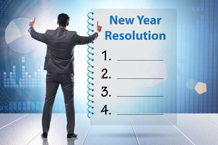 Businessman in new year resolution concept